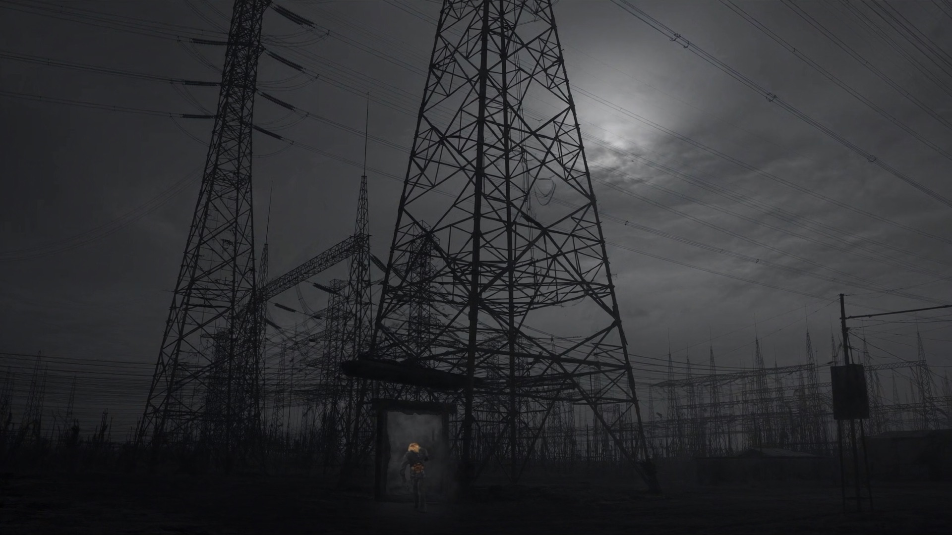 High-voltage electrical infrastructure at dusk.