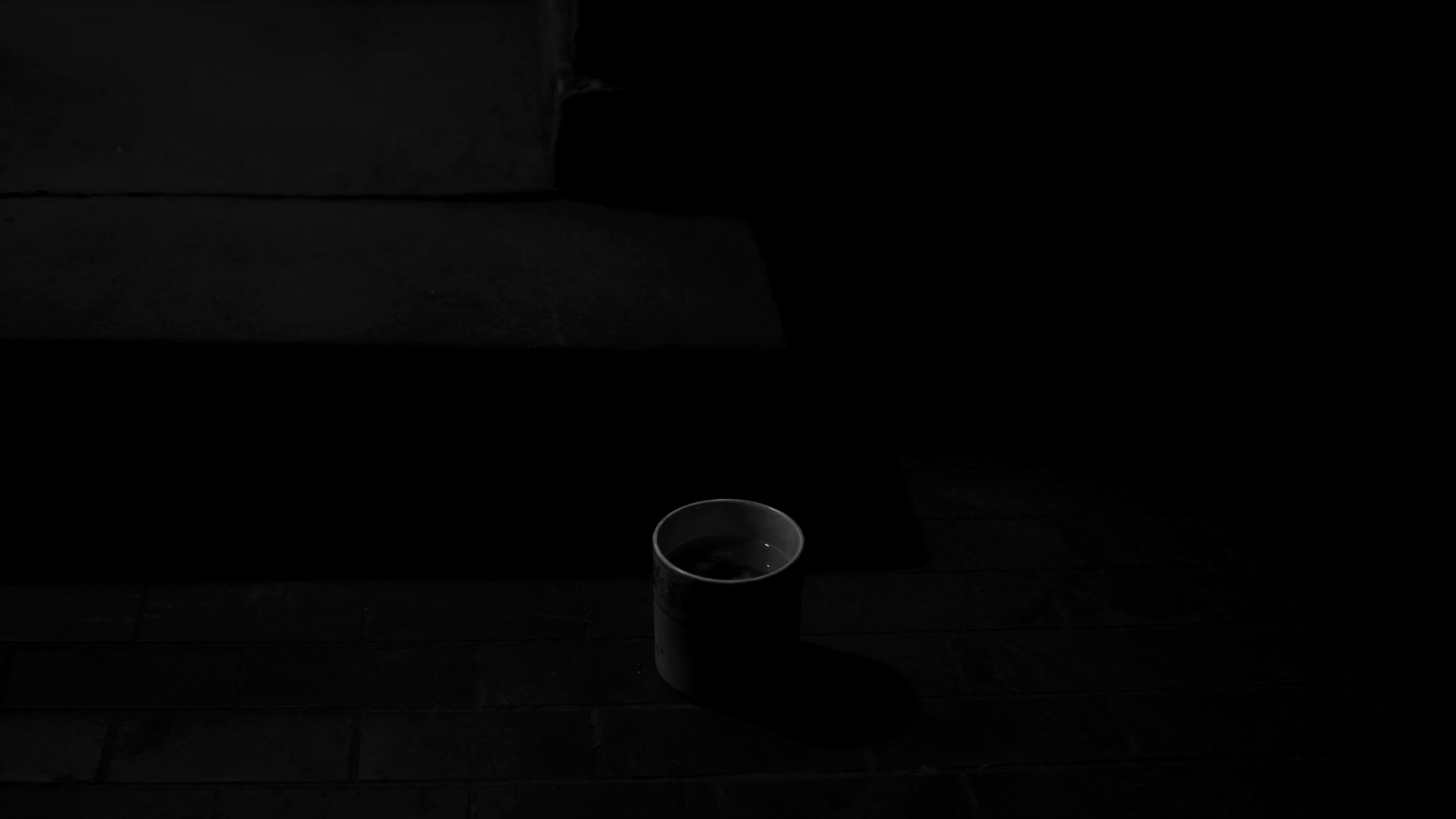 Editorial fashion photography against concrete.